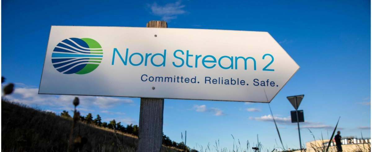 (FILES) This file photo taken on September 7, 2020 shows a road sign directing traffic towards the Nord Stream 2 gas line landfall facility entrance in Lubmin, north eastern Germany. - Poland's anti-monopoly watchdog on Wednesday, October 7, 2020 said it 